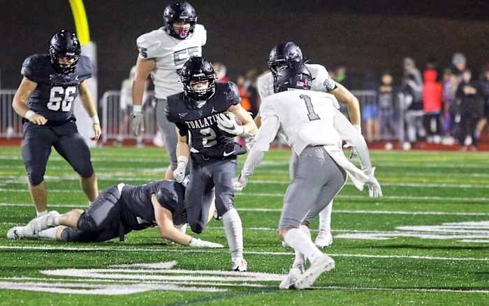 The Tualatin Tigers pulled off a 31-21 rain-soaked win over Tigard in the Three Rivers League finale on October 28, 2022 at Tualatin High School in Oregon.